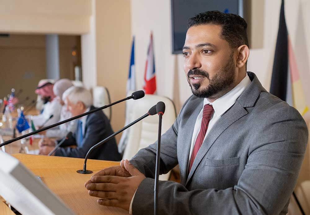 confident-politician-speaking-in-microphone-by-tri-C2F225X