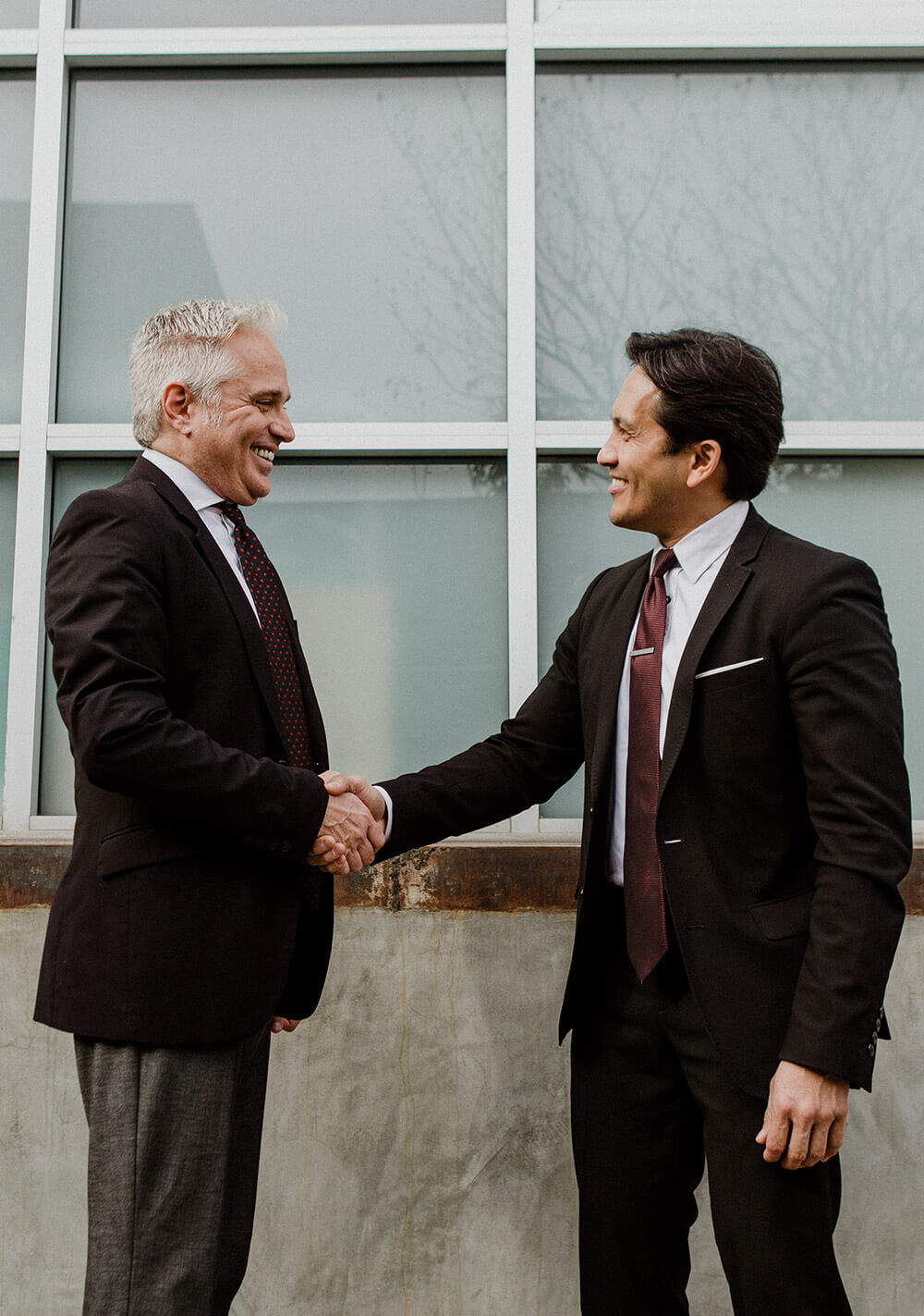 corporate-business-handshake-ZJ677AD