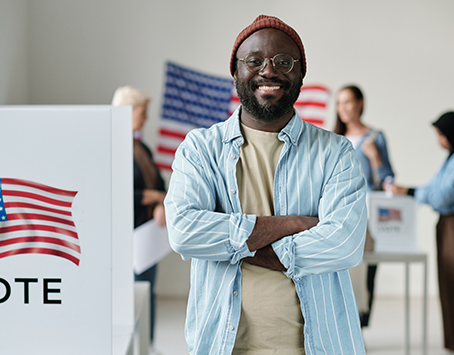 happy-young-african-american-man-in-casualwear-loo-ANTQC66