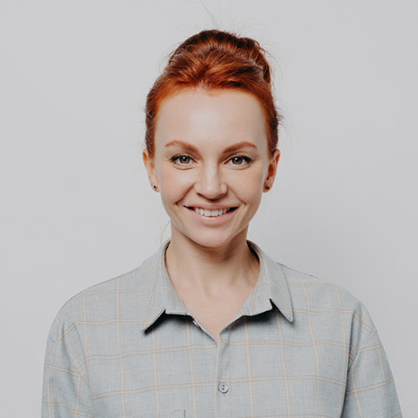 headshot-portrait-of-happy-young-caucasian-ginger--Q2AFGU7